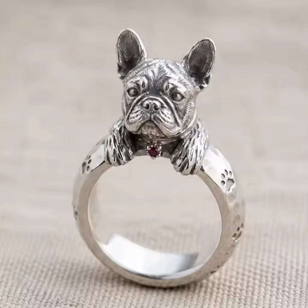 A shop ring customized into a Frenchie signet